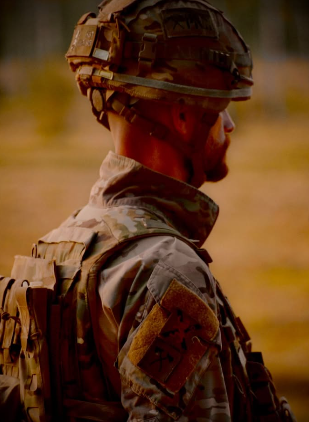 Serving soldier wearing field equipment